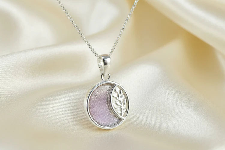 Solid silver pendant with leaf design