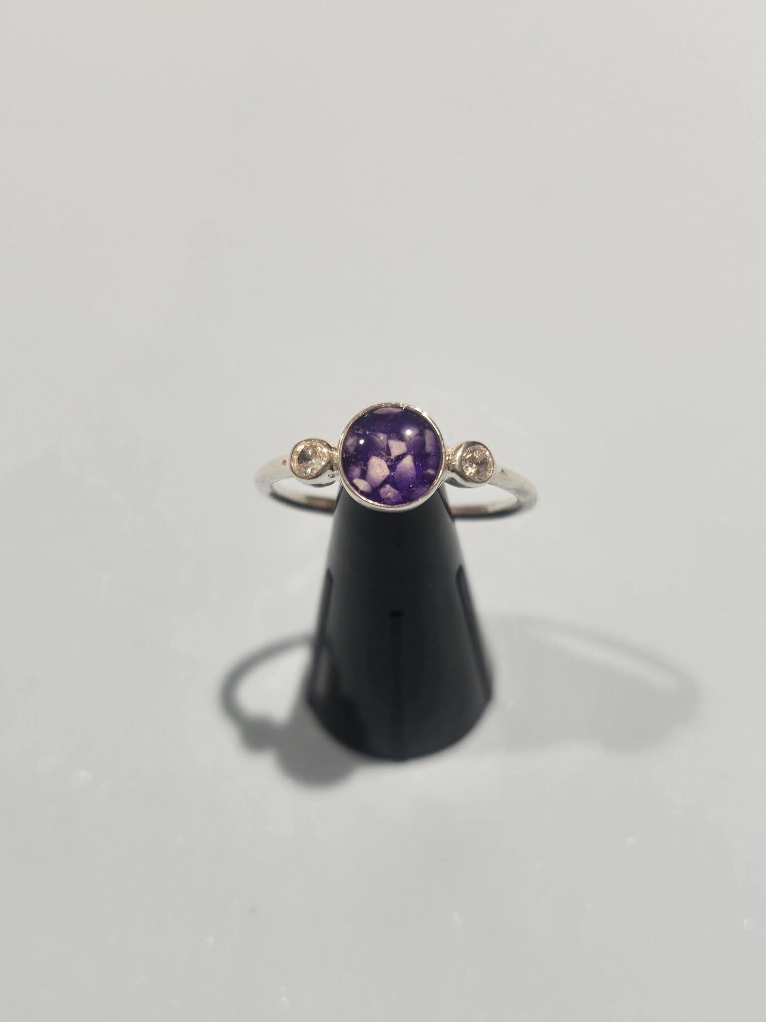 circle ring with CZ stone either side