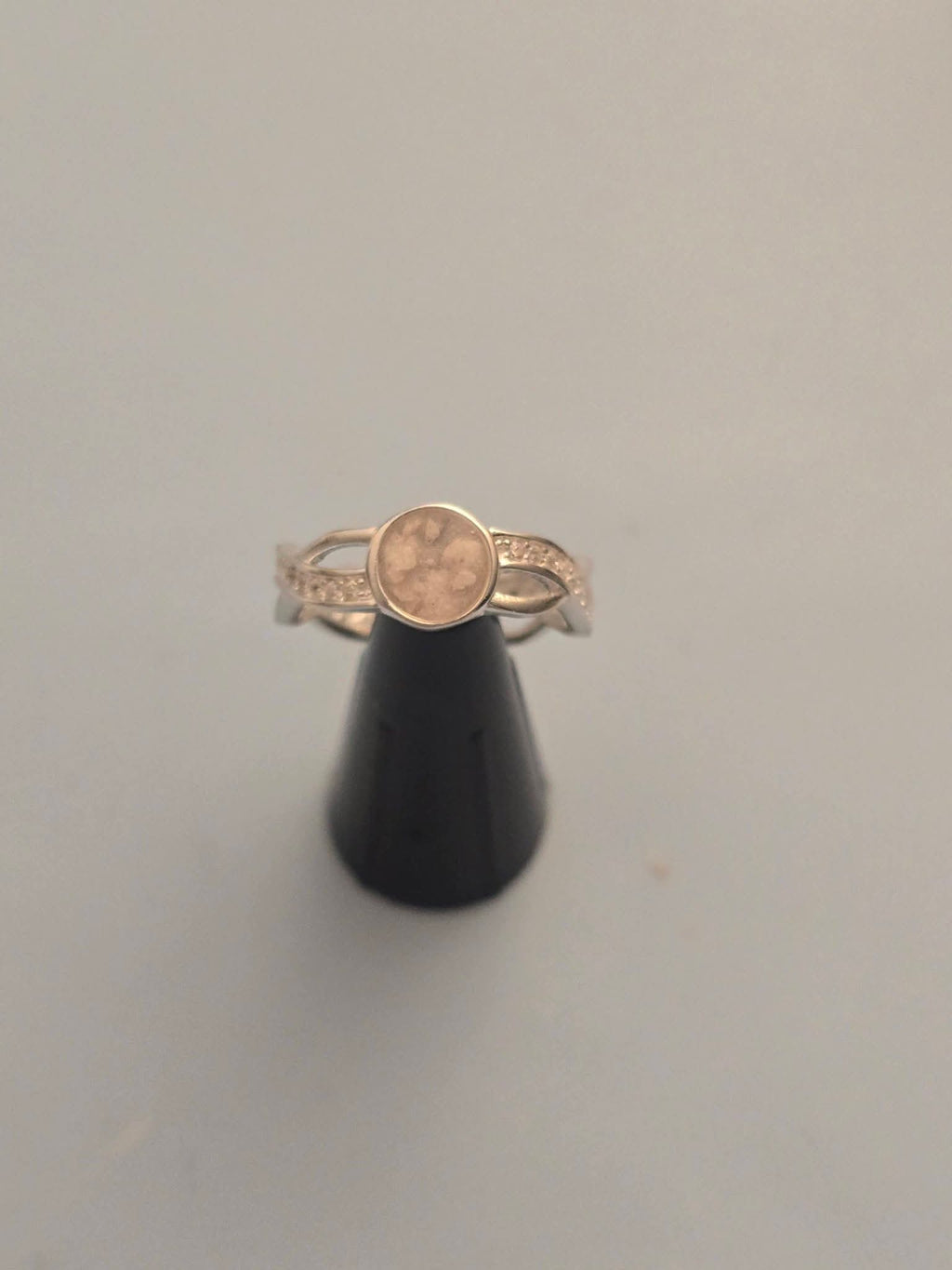 Solid Silver Entwinned Ring With CZ Stone