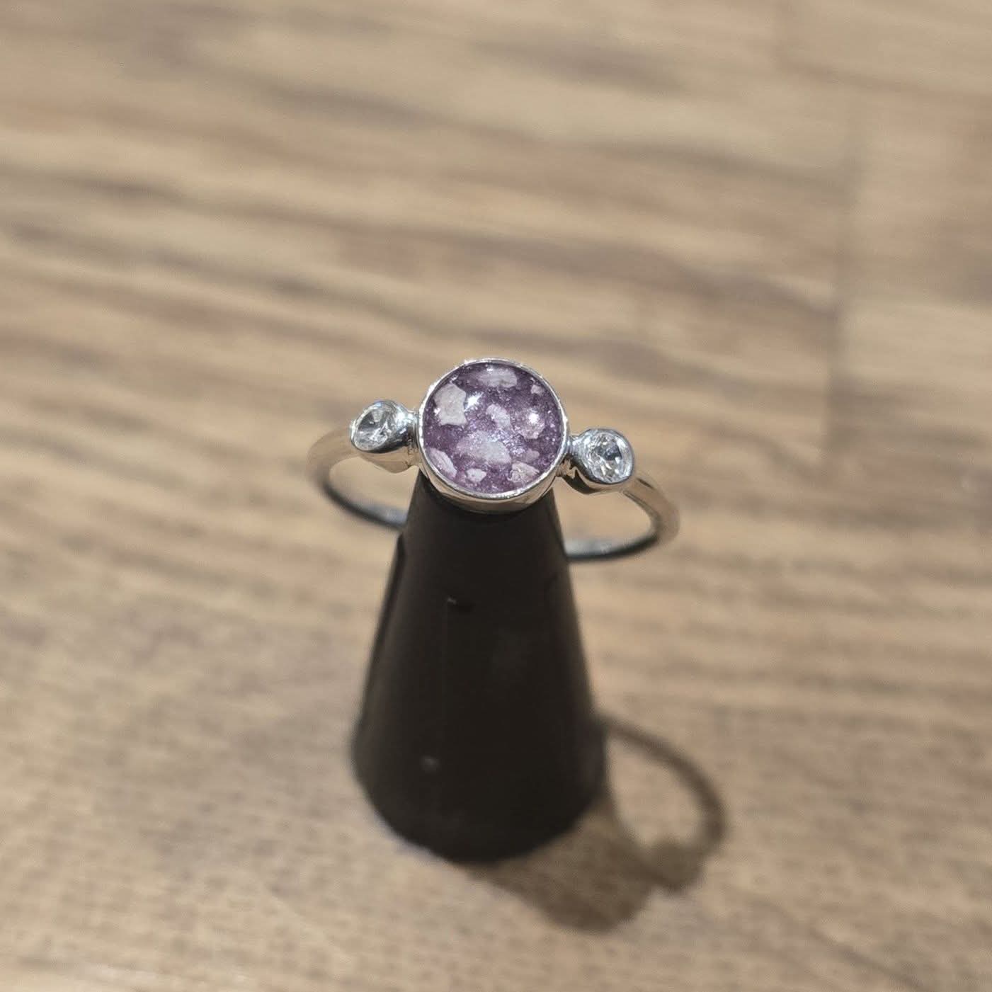 circle ring with CZ stone either side