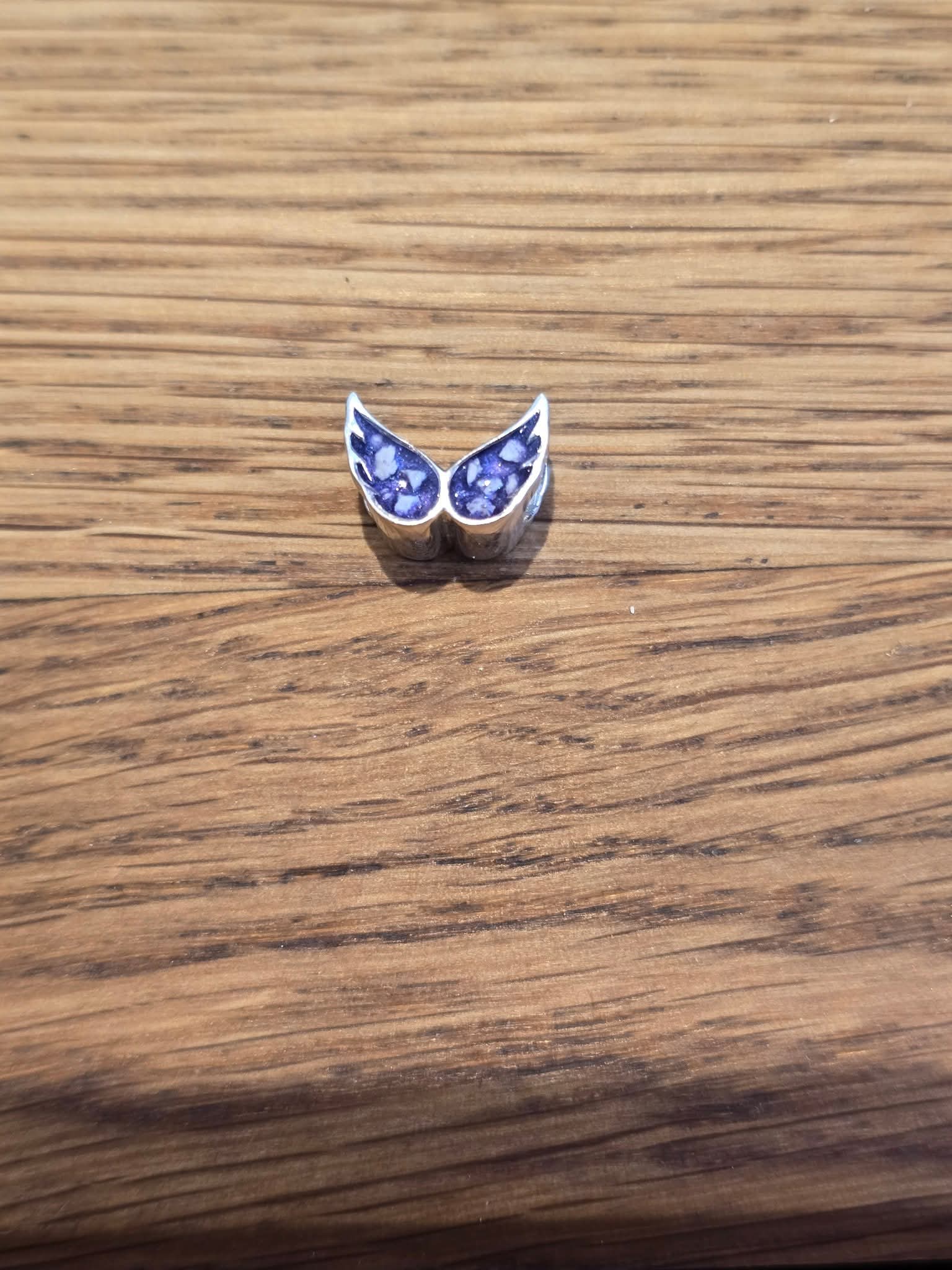 Angel wing charm