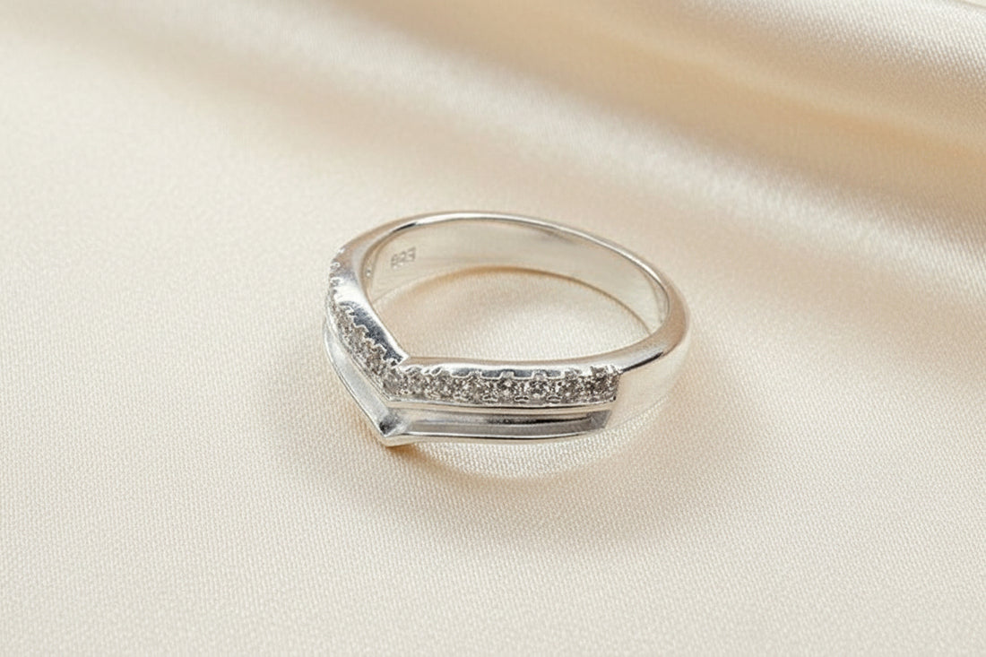 Solid silver wishbone style ring with CZ stones