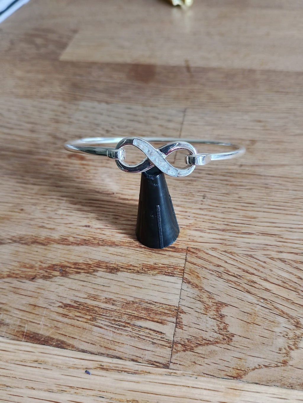 Infinity hook clasp bangle
