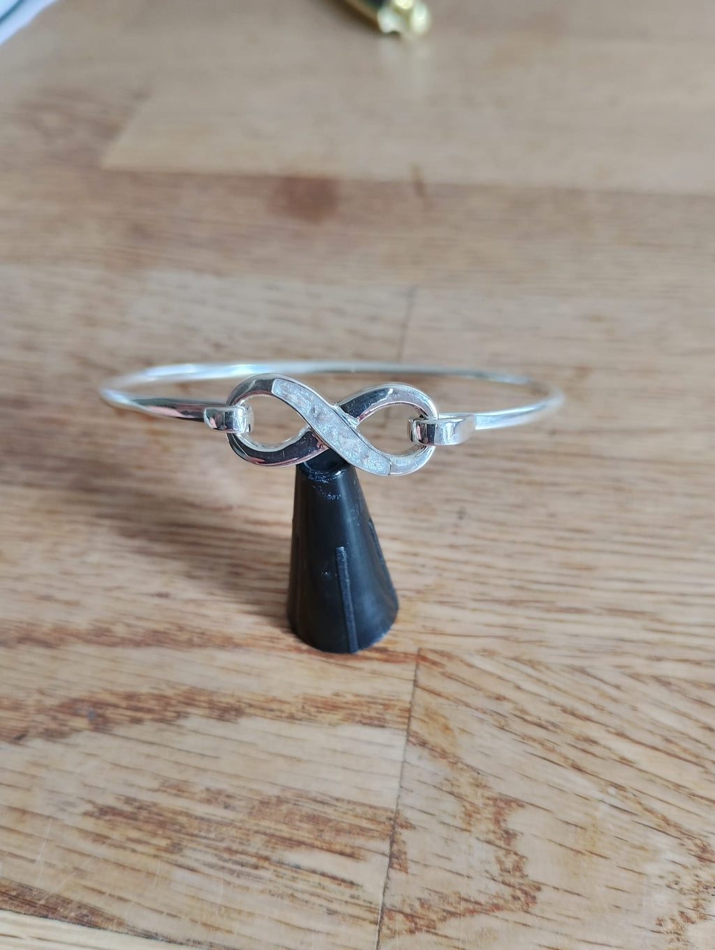 Infinity hook clasp bangle