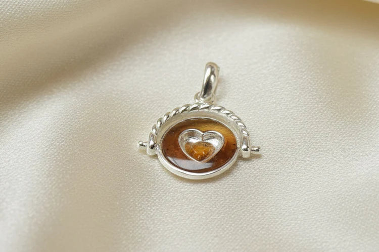 Silver Spinning pendant with heart