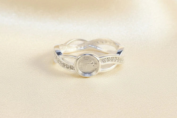 Solid Silver Entwinned Ring With CZ Stone