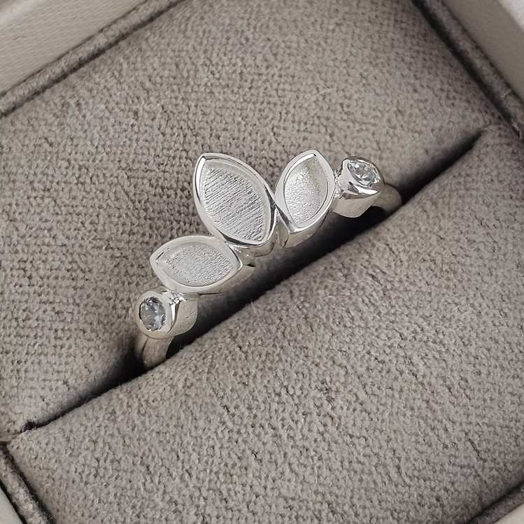 Triple leaf silver ring with CZ stones